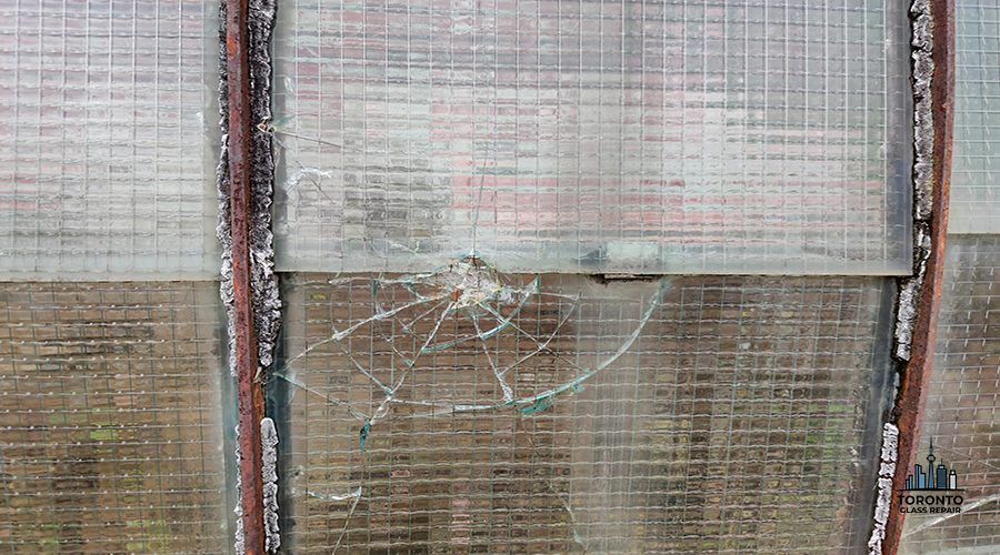 real gun bullet broken window glass