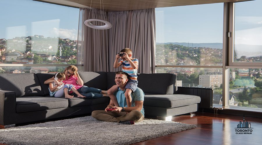 Happy family. Father, mother and children playing a video game Father and son playing video games together on the floor