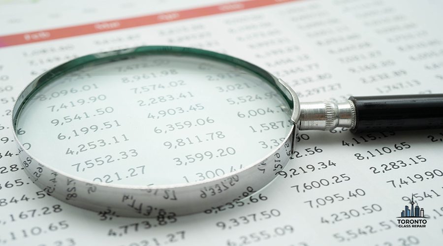 Magnifying glass on charts graphs paper. Financial development, Banking Account, Statistics, Investment Analytic research data economy.