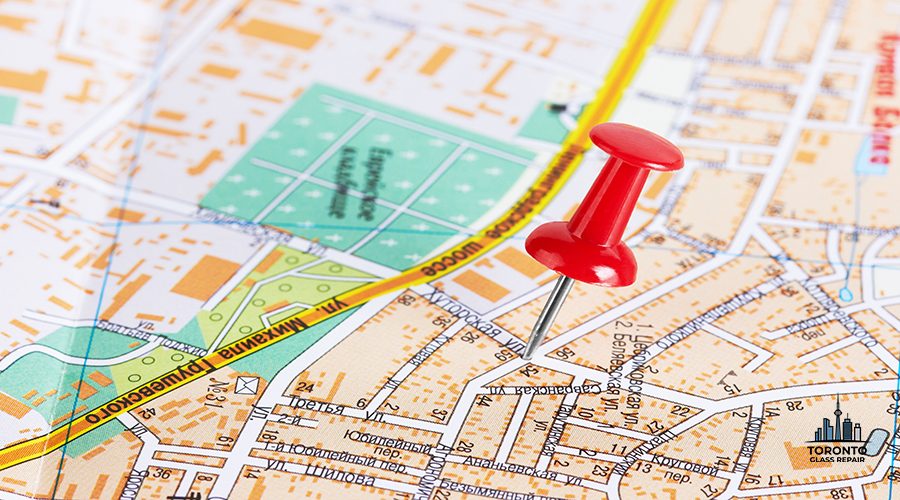 Red pushpin on a city map